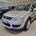 Suzuki SX4 1,6 4WD OutdoorX - Pienet kilometrit! Suomi-auto / Moottoril&auml;mmitin &amp; sis&auml;tilanpistoke / Vetokoukku **** Maksuaika 84 kk / k&auml;siraha alk. 0 &euro; / 3 kk lyhennysvapaa ****