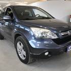 Honda CR-V 2,0i Elegance AT 4WD Business ** Vetokoukku / Lohko &amp; Sis&auml;tilal&auml;mmitin / Ilmastointi / Sadetunnistus / 2x Renkaat **